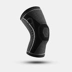 Black knee brace with textured pattern on a light gray background