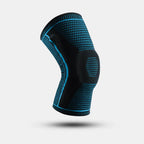 Black knee brace with blue accents on a light gray background