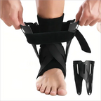 Person wearing a black ankle support brace with additional straps on a white background